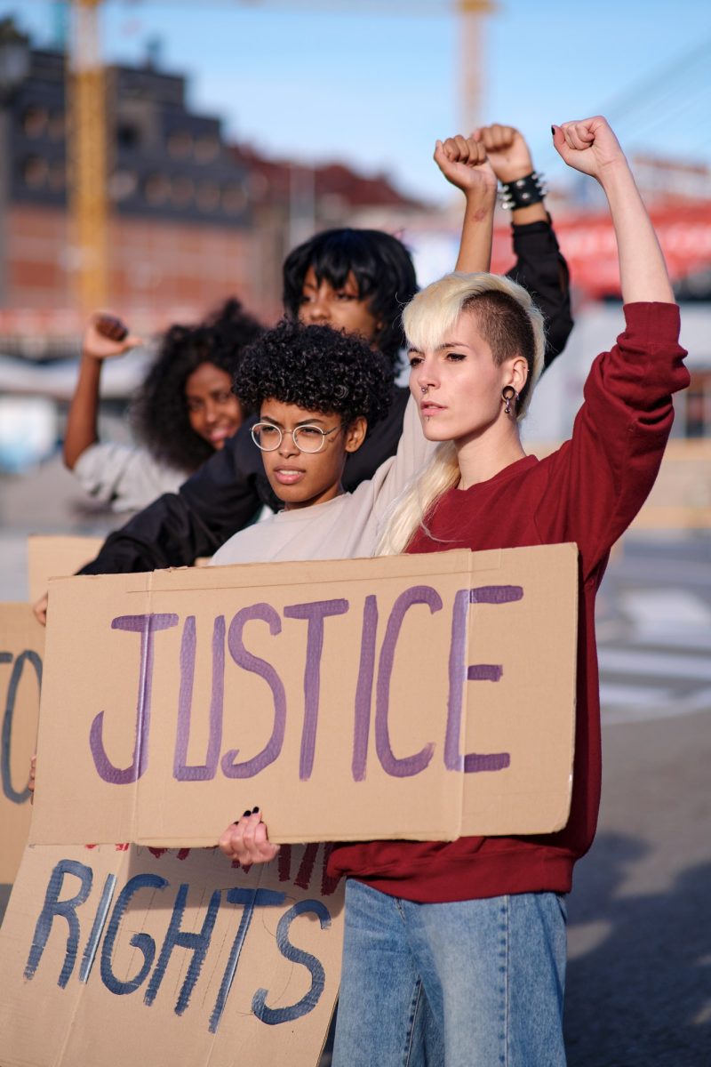 protesters-raising-their-arms-with-clenched-fists.jpg